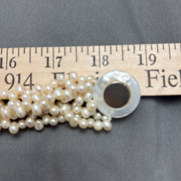 Salt Water Pearl Necklace
6 strand / 18 inches 
Magnetic mother of pearl clasp - Picture 6 of 7